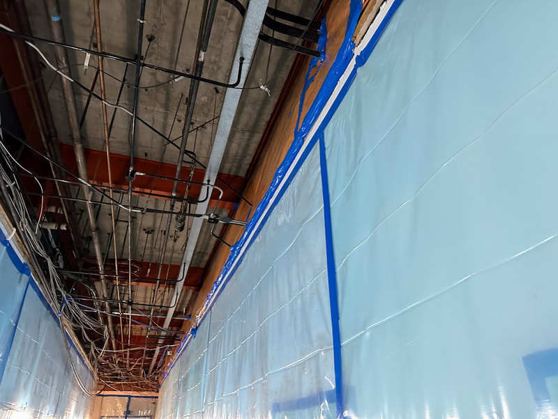 Asbestos insulating board ceiling removal in Prestwick airport by Greenair Environmental, click here for an asbestos ceiling removal quote in Ayrshire