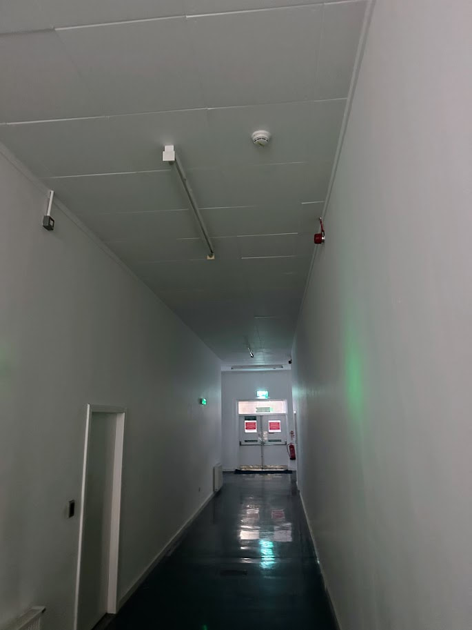 Asbestos insulating board removal from the IT Corridor in Prestwick airport by Greenair Environmental, click here for an asbestos removal quote