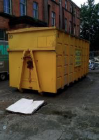 Enclosed 40-yard skip for asbestos waste in Glasgow, click and hire Greenair asbestos removal specialists in Glasgow and Edinburgh